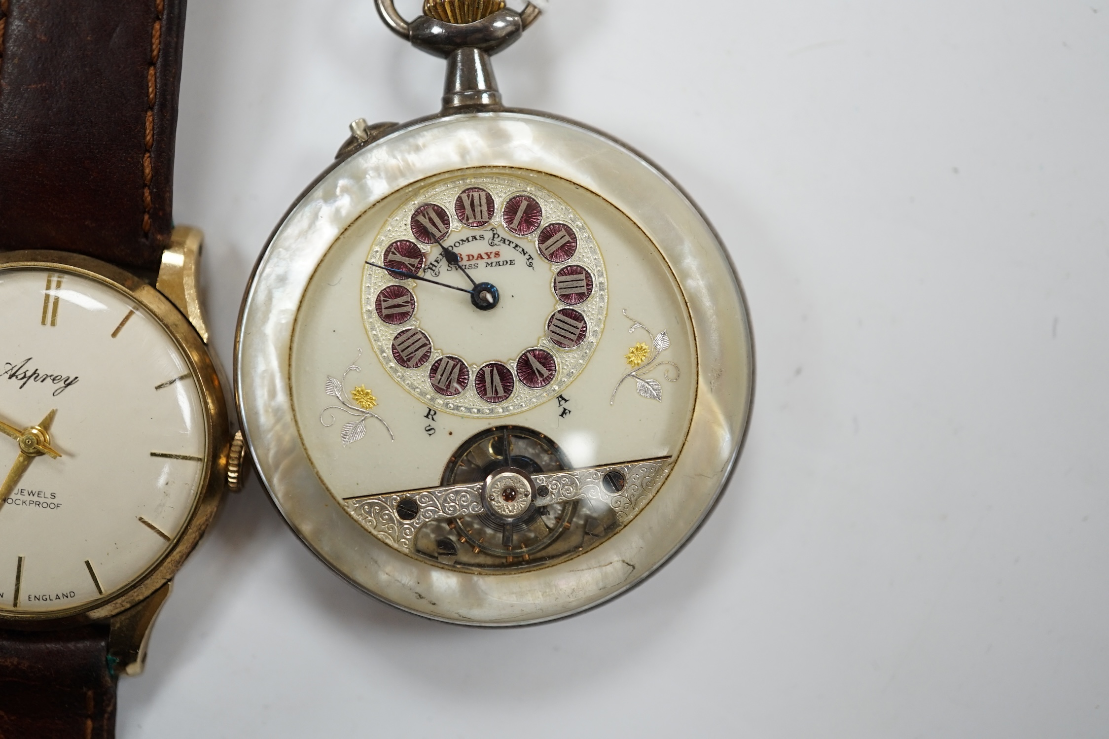 A gentleman's 9ct gold manual wind wrist watch, retailed by Asprey, together with a silver wrist watch and a mother of pearl cased Hebdomas pocket watch. Condition - poor to fair